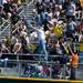 Michigan fans reach for a home run ball during the game against Northwestern on Sunday, May 5. Daniel Brenner I AnnArbor.com